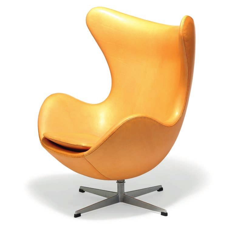 1070 ARNE JACOBSEN b. Copenhagen 1902, d. s.p. 1971 "The Egg Chair". A pair of easy chairs with profiled aluminum base.