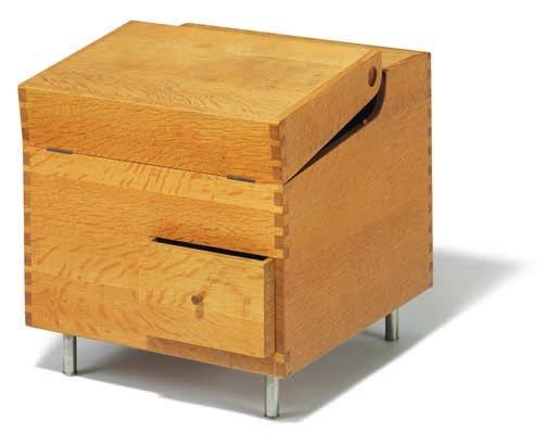 1112 HANS J. WEGNER b. Tønder 1914, d. Gentofte 2007 "AT 34". A cube-shaped solid oak bar cabinet on round steel legs.