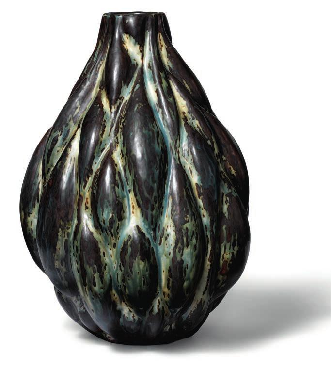 927 AXEL SALTO b. Copenhagen 1889, d. Frederiksberg 1961 Large stoneware vase modelled in sprouting style.