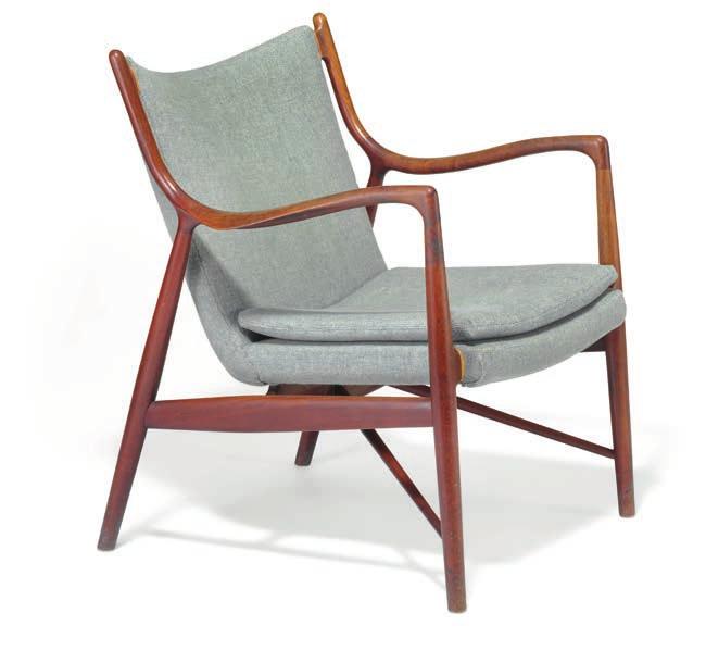 946 FINN JUHL b. Frederiksberg 1912, d. Ordrup 1989 "FJ 45". A teak easy chair. Seat, back and loose seat cushion upholstered with light blue wool.