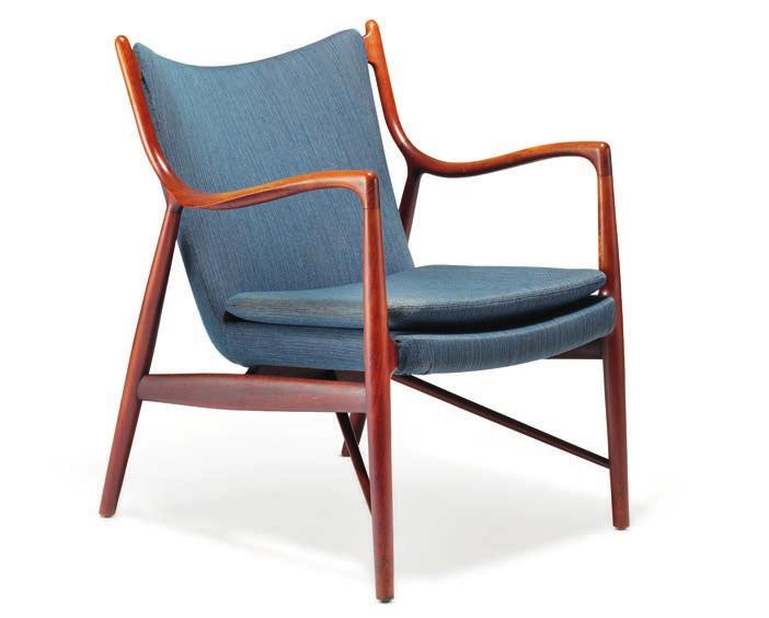 948 948 FINN JUHL b. Frederiksberg 1912, d. Ordrup 1989 "FJ 45". A teak easy chair. Sides, back and loose seat cushion upholstered with blue wool. Designed 1945.