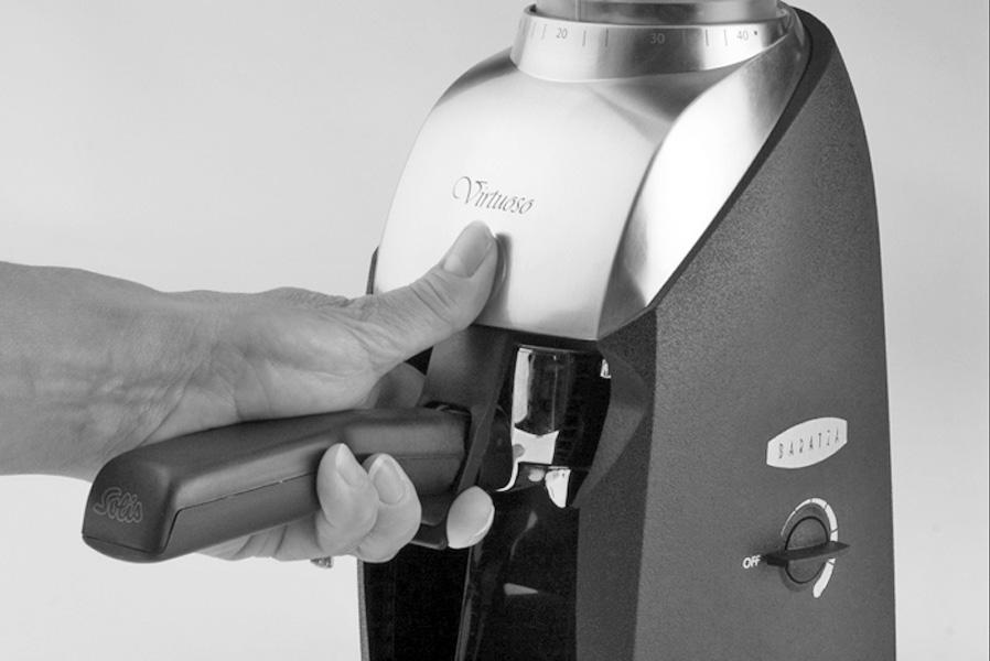 Frontmonteret puls knap Til en kort formalingsproces, er Virtuoso udstyret med en frontmonteret puls knap. Den kan bruges til at kværne direkte i en espresso brygningskurv.
