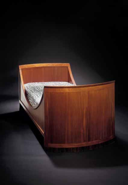 617 KAARE KLINT b. 1888, d. 1954 "Kuglesengen". Rare bed of Cuban mahogany with base of Macassar. Designed 1938. Made by Rud. Rasmussen cabinetmakers, Copenhagen. H. 85. W. 102.