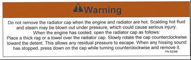 Mærkat nr. 11 Fjern ikke kølerdækslet når motor og køler er varme.