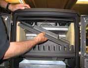 How to position the access baffle The smoke shield (2) helps ensure a highly efficient stove.