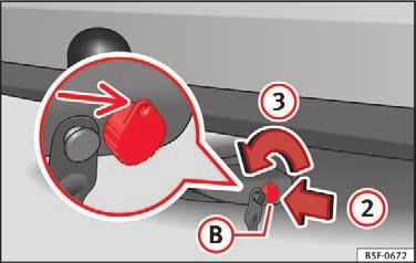 Betjening Afmontering af aftageligt kuglehoved trin 1 Fig. 186 Aftagning af låseafdækning Afmonter aldrig det aftagelige kuglehoved, hvis anhængeren stadig er tilkoblet.