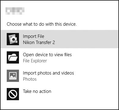1 Under Import pictures and videos (Importér billeder og videoer) skal du klikke på Change program (Skift program).
