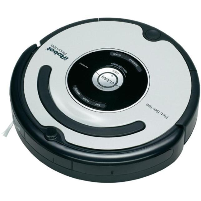 Figur 1: Robotstøvsugeren Roomba 564 samt fjernbetjening Robotstøvsugeren har fungeret og virket teknisk upåklageligt.