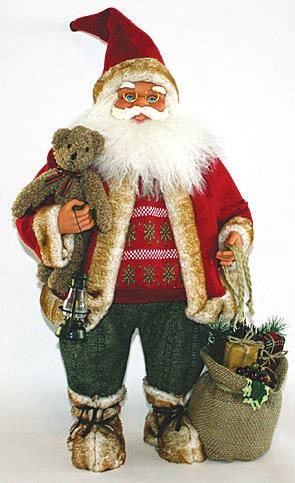 stk. 568,00) 48cm. høj stof julenisse med julegave sæk og bamse. Best.nr.