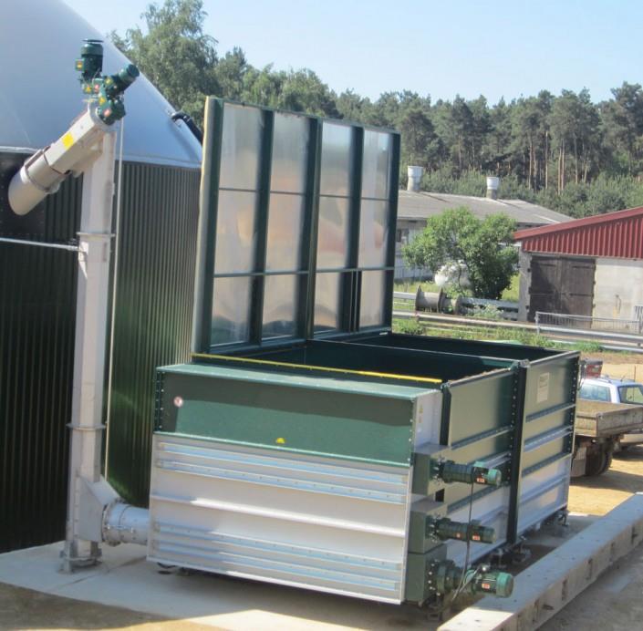 Bilag 2 Biogasanlægget Outrup Biogas - Redegørelse vedr. ønske om at fravige standardvilkår for så vidt angår læssehal og centralt lugtfilter. Baggrund.