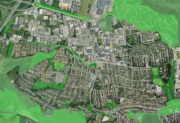 Fritidsområderne og potentielle økologiske forbindelsesområder i kommuneplanen er fremhævet med grønt på kortet.
