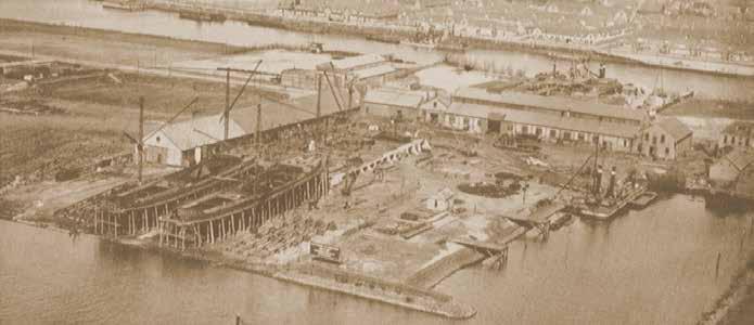 Luchtfoto van De Klop uit 1923. Op de helling zijn 2 stoomhoppers in aanbouw. kerak. De heer H.