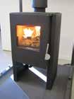 When kindling a cold stove, it is useful to leave the door ajar the first few minutes and open the secondary air supply completely the right regulation handle.
