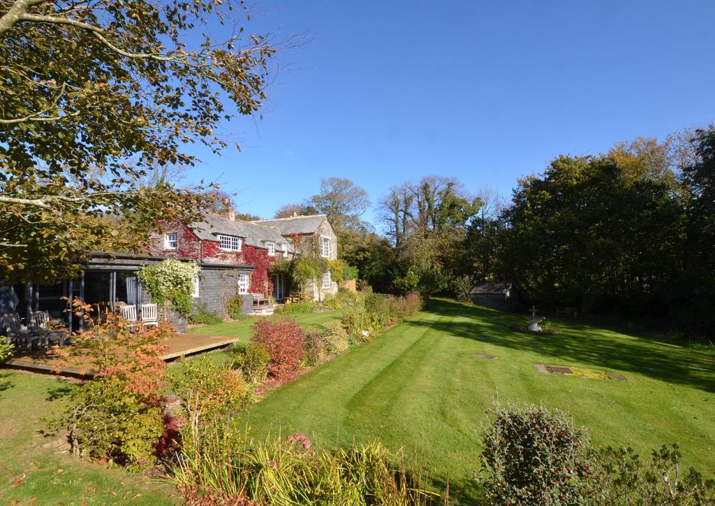 The Glebe Cottage St Mabyn Nr Wadebridge PL30 3BX Stunning detached cottage Delightful gardens & grounds of circa 1 acre Long private driveway Sitting room with open fireplace Kitchen Dining room